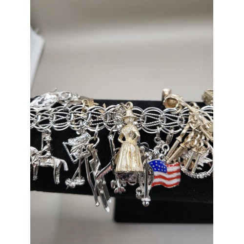 6A - Sterling Silver Charm Bracelet Weighs 91g Has Lots of Charms Measures 18cm Long Unclasped