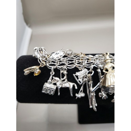 6A - Sterling Silver Charm Bracelet Weighs 91g Has Lots of Charms Measures 18cm Long Unclasped