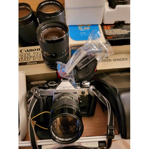 45A - Collection of Canon Camera Equipment Includes Canon AE-1 Camera along with Lenses Speedlights, Light... 