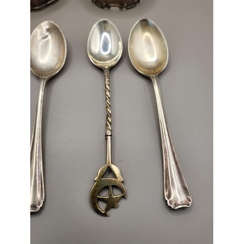 28 - Four Sterling Teaspoons along with Two Sterling Napkin Rings Weighs 99g