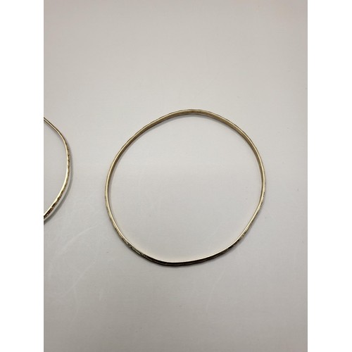 38 - Two 9ct Gold Bangles Weighs 7.8g They Measure 21cm In Circumference They Are A Little Misshaped Not ... 