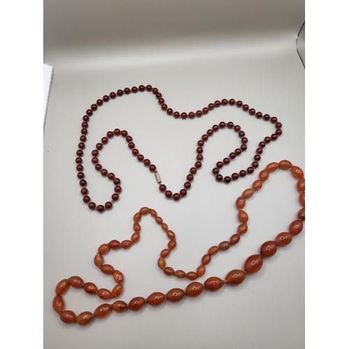 93 - Two Beaded Necklace Light Amber Coloured One Measures 80cm Long if Unclasped The Red One Measures 10... 