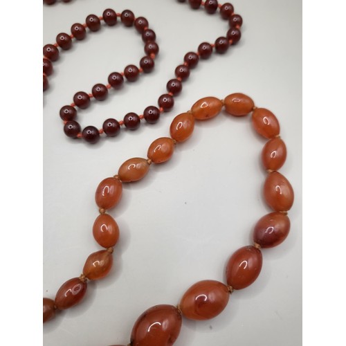 93 - Two Beaded Necklace Light Amber Coloured One Measures 80cm Long if Unclasped The Red One Measures 10... 