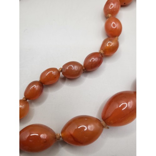 93 - Two Beaded Necklace Light Amber Coloured One Measures 80cm Long if Unclasped The Red One Measures 10... 