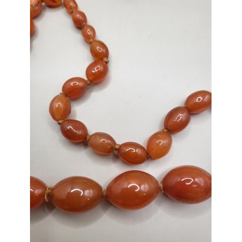 93 - Two Beaded Necklace Light Amber Coloured One Measures 80cm Long if Unclasped The Red One Measures 10... 