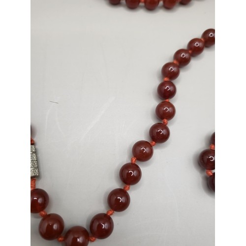 93 - Two Beaded Necklace Light Amber Coloured One Measures 80cm Long if Unclasped The Red One Measures 10... 