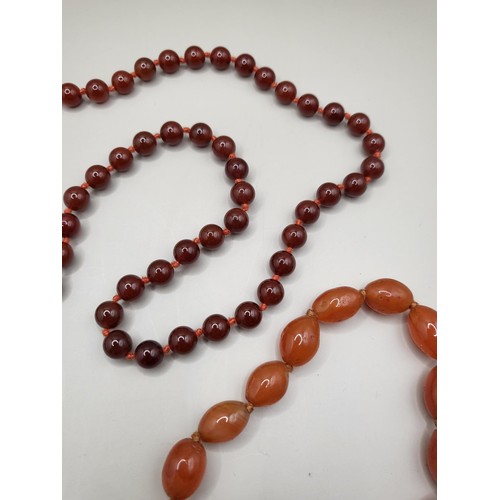 93 - Two Beaded Necklace Light Amber Coloured One Measures 80cm Long if Unclasped The Red One Measures 10... 