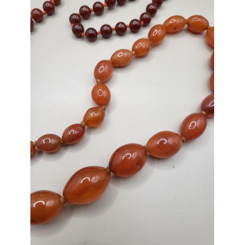 93 - Two Beaded Necklace Light Amber Coloured One Measures 80cm Long if Unclasped The Red One Measures 10... 