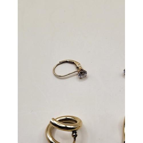 18 - Two Pairs of Gold Earrings 9ct Gold Twist Ones Weigh 1.8g & CZ Ones Weigh 1.2g&nbsp;