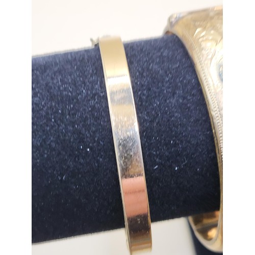 19 - Two 9ct Rolled Gold Bangles in Reasonable Good Condition&nbsp;