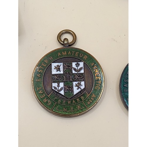 59 - Six L.N.E.R Medals ( Not Silver) along with Austrain Ski Medal Badge&nbsp;