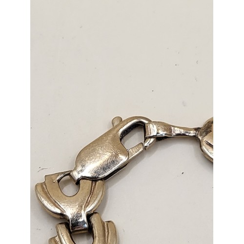 41 - 10ct Gold Wishbone Design Bracelet Weighs 14.4g Measures 20cm Unclasped Hallmarked