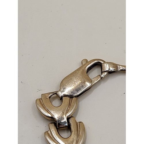 41 - 10ct Gold Wishbone Design Bracelet Weighs 14.4g Measures 20cm Unclasped Hallmarked