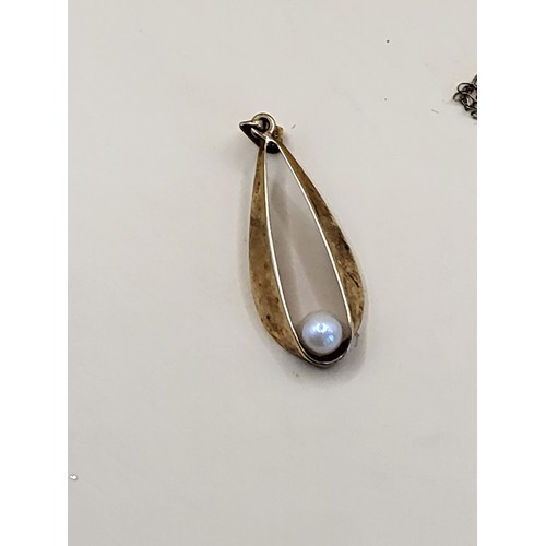 50 - 14ct Pendant with Pearl Weighs 1g on 9ct Gold Chain Weighs 0.6g Both Hallmarked&nbsp;