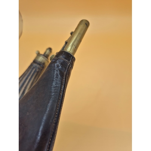 219 - Two Vintage Gun Powder Flask Includes a Copper Dixon & Sons One along with a Unmarked Leather On... 