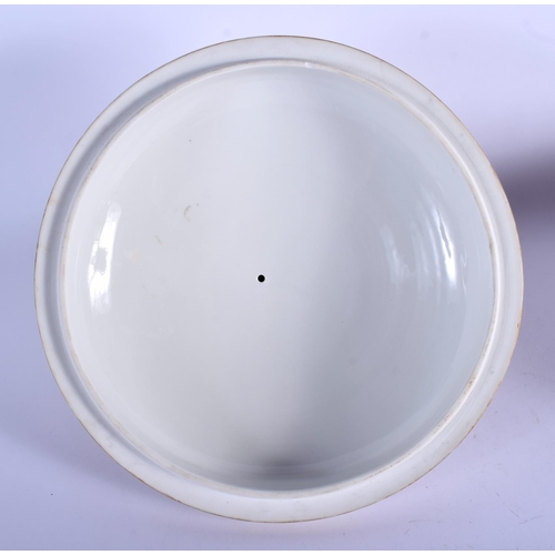 104 - A FINE LARGE 19TH CENTURY KPM BERLIN TUREEN AND COVER wonderfully painted with figures enjoying a fe... 