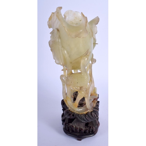 1164 - A LARGE 19TH CENTURY CHINESE CARVED JADE FLOWER GROUP Qing, of openwork form, modelled as a flowerin... 