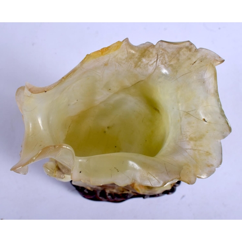 1164 - A LARGE 19TH CENTURY CHINESE CARVED JADE FLOWER GROUP Qing, of openwork form, modelled as a flowerin... 