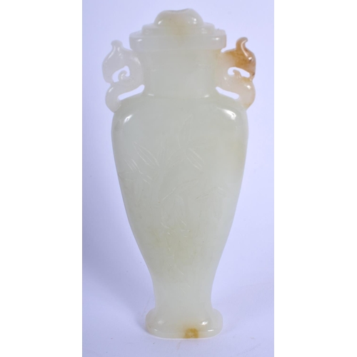 1170 - AN UNUSUAL EARLY 20TH CENTURY CHINESE CARVED JADE VASE Late Qing/Republic, decorated with foliage. 8... 