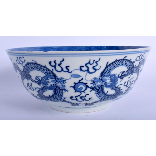 1185 - A 19TH CENTURY CHINESE BLUE AND WHITE PORCELAIN BOWL Qing, bearing Kangxi marks to base, painted wit... 