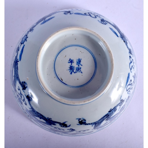 1185 - A 19TH CENTURY CHINESE BLUE AND WHITE PORCELAIN BOWL Qing, bearing Kangxi marks to base, painted wit... 