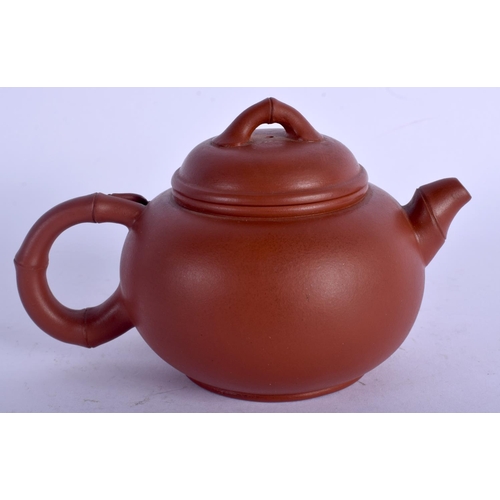 1192 - AN EARLY 20TH CENTURY CHINESE YIXING POTTERY TEAPOT AND COVER by Ma Hui Rong, moulded with bamboo sh... 