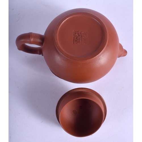 1192 - AN EARLY 20TH CENTURY CHINESE YIXING POTTERY TEAPOT AND COVER by Ma Hui Rong, moulded with bamboo sh... 