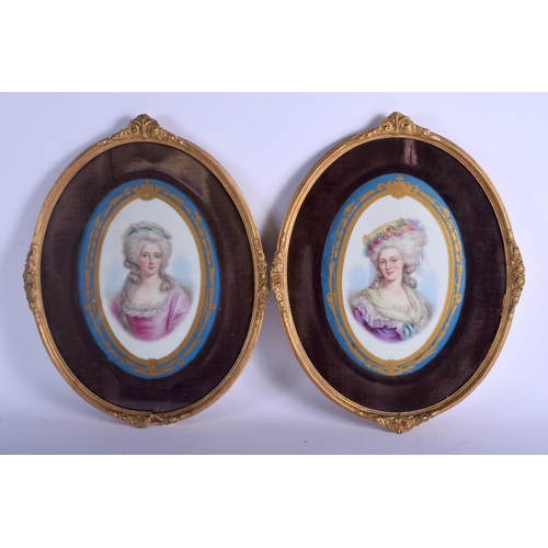 120 - A LARGE PAIR OF 19TH CENTURY FRENCH SEVRES PORCELAIN PLAQUES painted with pretty females. Porcelain ... 