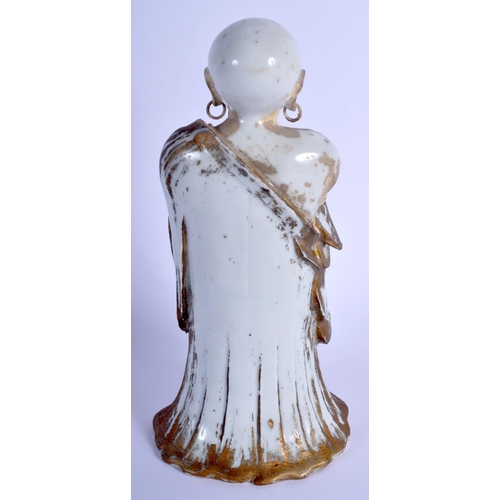 1200 - AN 18TH CENTURY JAPANESE EDO PERIOD PORCELAIN FIGURE OF AN IMMORTAL modelled holding a gilt object. ... 