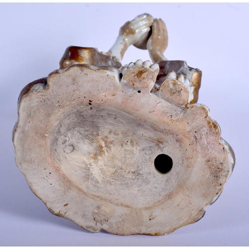 1200 - AN 18TH CENTURY JAPANESE EDO PERIOD PORCELAIN FIGURE OF AN IMMORTAL modelled holding a gilt object. ... 