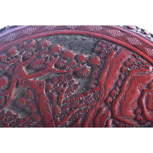 1211 - A LARGE 18TH CENTURY CHINESE CINNABAR LACQUER BOX AND COVER Qianlong, decorated with scholars within... 