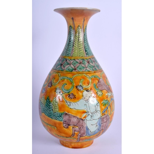 1222 - A CHINESE YELLOW GLAZED PORCELAIN VASE 20th Century, painted with figures. 20 cm high.
