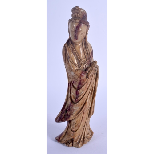 1243 - A 19TH CENTURY CHINESE CARVED SOAPSTONE FIGURE OF GUANYIN Qing, modelled holding a scroll. 19 cm hig... 