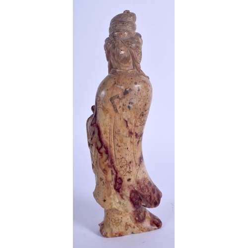 1243 - A 19TH CENTURY CHINESE CARVED SOAPSTONE FIGURE OF GUANYIN Qing, modelled holding a scroll. 19 cm hig... 