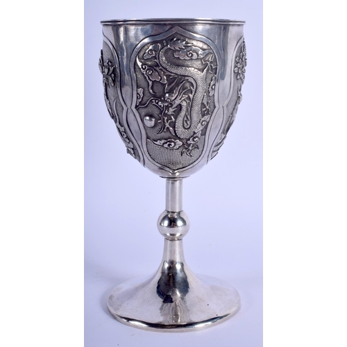 1244 - A 19TH CENTURY CHINESE EXPORT SILVER GOBLET Attributed to Wang Hing, decorated with dragons and figu... 