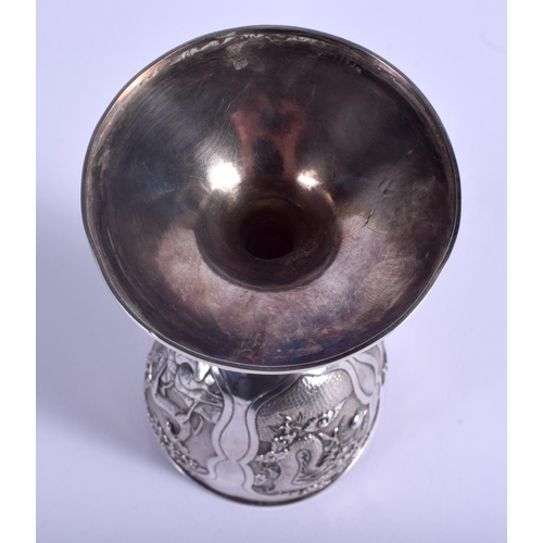 1244 - A 19TH CENTURY CHINESE EXPORT SILVER GOBLET Attributed to Wang Hing, decorated with dragons and figu... 