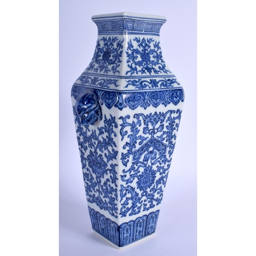 1245 - A CHINESE BLUE AND WHITE SQUARE FORM VASE 20th Century, painted with flowers and vines. 30 cm high.