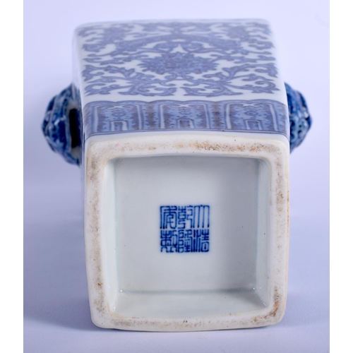 1245 - A CHINESE BLUE AND WHITE SQUARE FORM VASE 20th Century, painted with flowers and vines. 30 cm high.