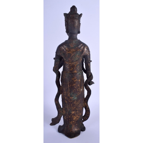 1246 - A LARGE CHINESE QING DYNASTY LACQUERED BRONZE FIGURE OF A BUDDHSITIC DEITY modelled in flowing robes... 