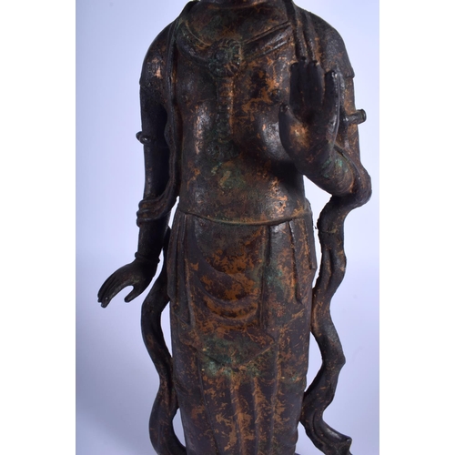 1246 - A LARGE CHINESE QING DYNASTY LACQUERED BRONZE FIGURE OF A BUDDHSITIC DEITY modelled in flowing robes... 