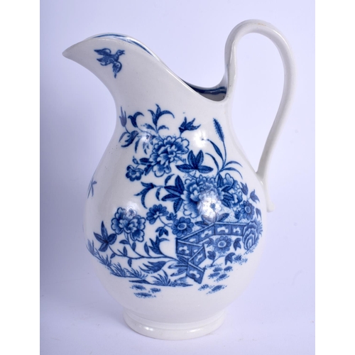 125 - Worcester attractive ewer printed with a fence and flowers. 13 cm high.