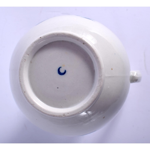 125 - Worcester attractive ewer printed with a fence and flowers. 13 cm high.