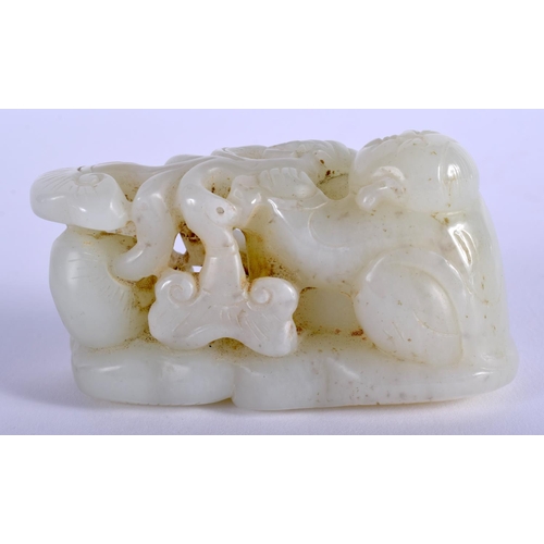 1253 - AN EARLY 20TH CENTURY CHINESE CARVED GREENISH WHITE JADE FIGURE Late Qing/Republic, modelled as a bo... 