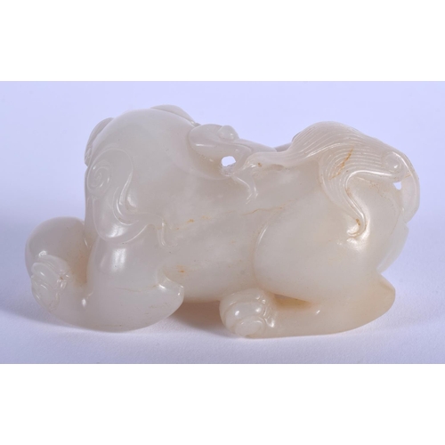 1254 - AN EARLY 20TH CENTURY CHINESE CARVED GREYISH WHITE JADE BEAST Late Qing/Republic. 7 cm x 4 cm.