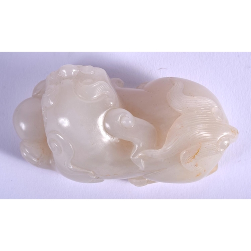 1254 - AN EARLY 20TH CENTURY CHINESE CARVED GREYISH WHITE JADE BEAST Late Qing/Republic. 7 cm x 4 cm.
