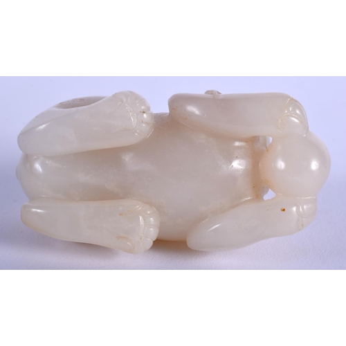 1254 - AN EARLY 20TH CENTURY CHINESE CARVED GREYISH WHITE JADE BEAST Late Qing/Republic. 7 cm x 4 cm.