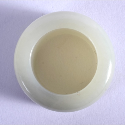 1255 - AN EARLY 20TH CENTURY CHINESE CARVED GREYISH GREEN JADE ARCHERS RING Late Qing/Republic. 3 cm wide.