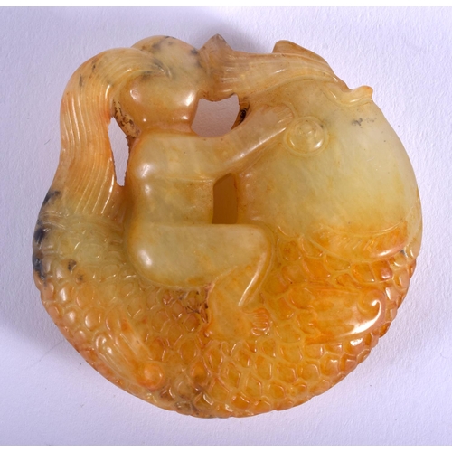 1262 - AN UNUSUAL 19TH CENTURY CHINESE CARVED YELLOW JADE CARP Qing, modelled with a boy riding upon it. 4.... 