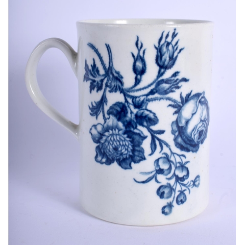 128 - Worcester cylindrical mug printed with flower sprays including a rose. 12 cm high.