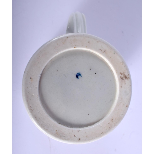 128 - Worcester cylindrical mug printed with flower sprays including a rose. 12 cm high.